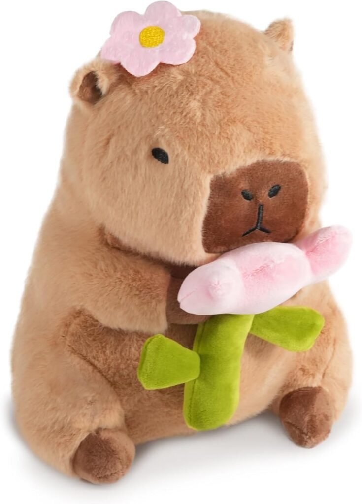 Peluche de Capibara con flor linda rosada