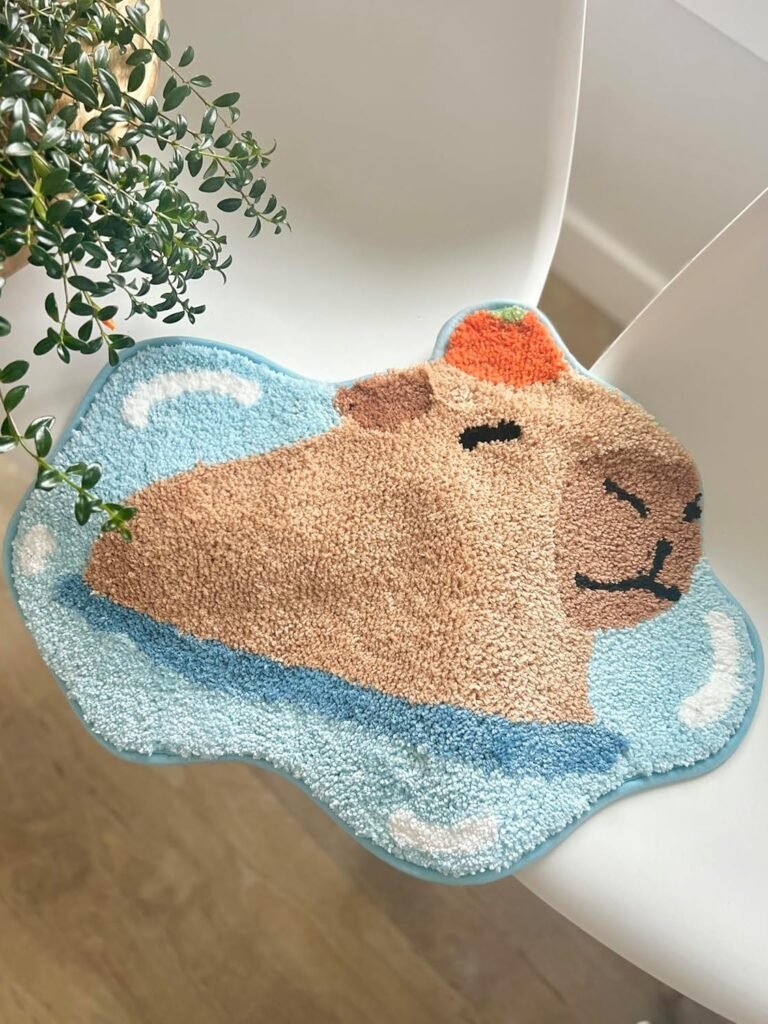 Alfombra de Capibara con una Naranja